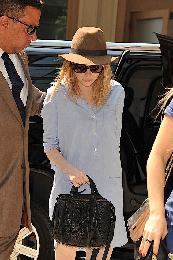 Reference image illustrating Emma Stone's Handbag Collection: From Alexander Wang to Lanvin Clutches