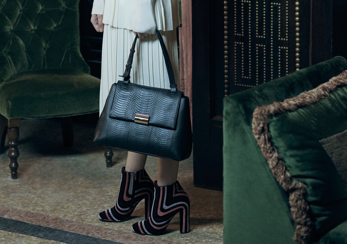 Reference image illustrating Exclusive First Look: Ferragamo Gancio Clip Top Handle Bag in Stunning New Campaign
