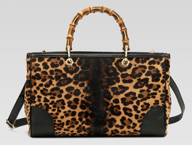 Reference image illustrating Gucci Fall 2013 Handbags: Bold Lady Buckle Hardware and Striking Jaguar Print