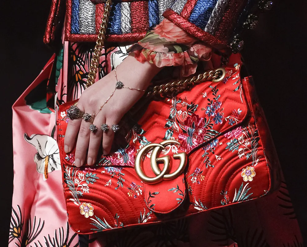Reference image illustrating Gucci Spring 2017 Runway Bags: Chinoiserie Florals, Animal Clasps & Brocade Details
