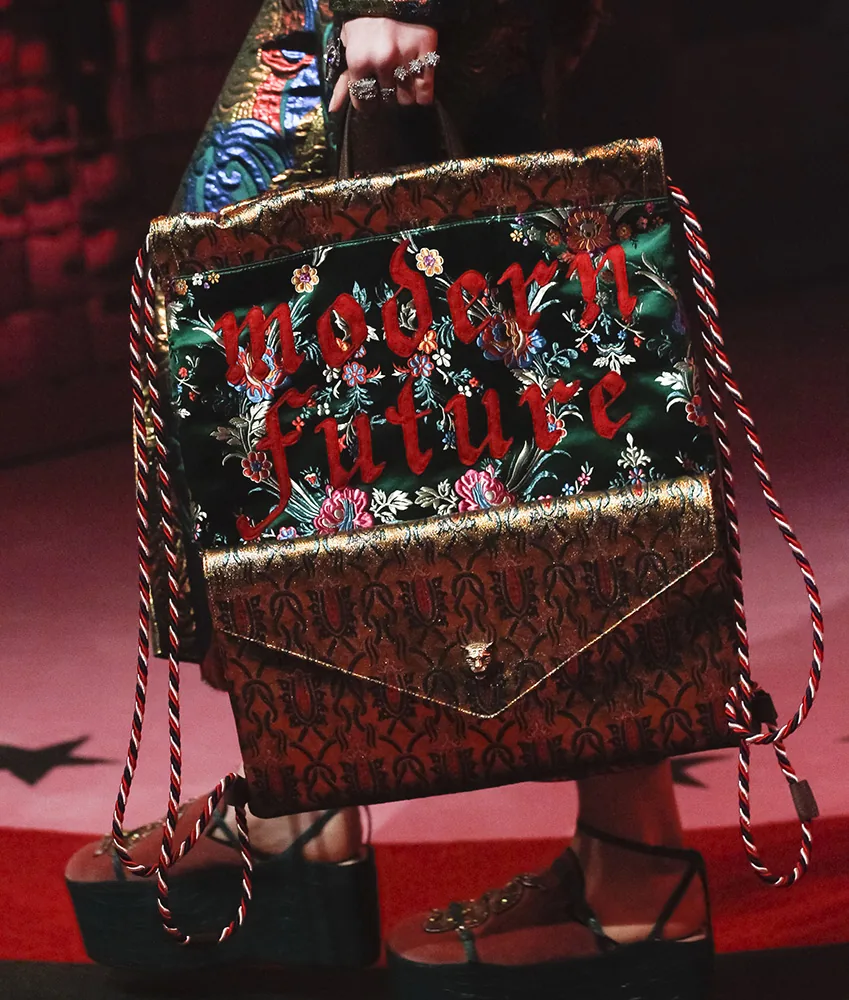 Reference image illustrating Gucci Spring 2017 Runway Bags: Chinoiserie Florals, Animal Clasps & Brocade Details