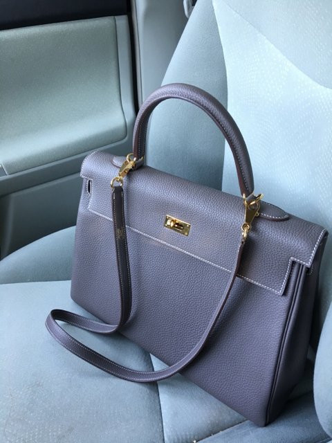 Reference image illustrating Hermès Bags Ride Shotgun: PurseForum Members Share Their Best Car-Seat Styling Moments