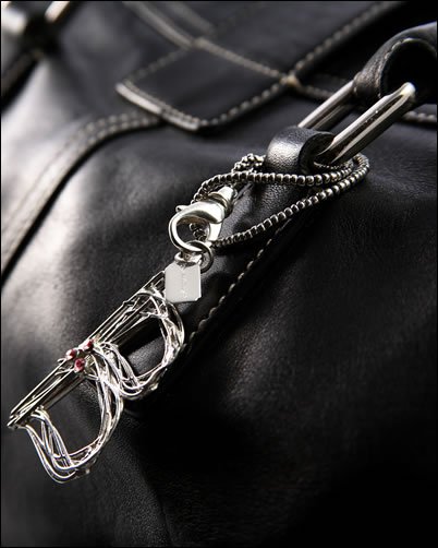 It’s Myne Bag Charms: Custom Sterling Silver & Swarovski Crystal Initials for Your Luxury Handbag cover image