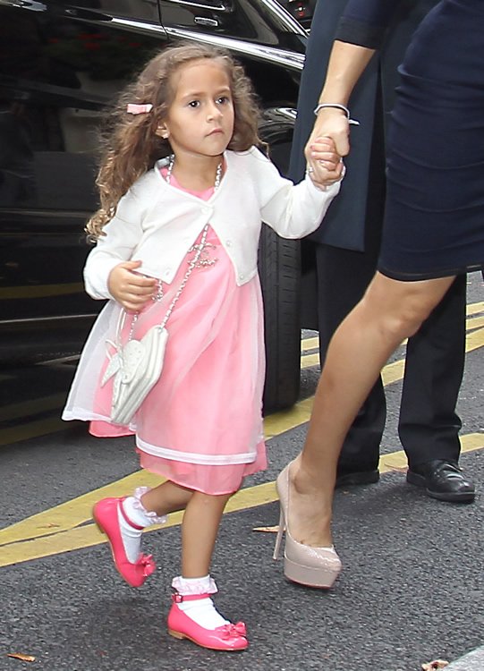 Reference image illustrating Jennifer Lopez and Daughter Emme Twin in Chanel at Paris Fashion Week