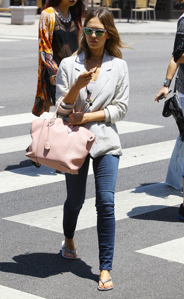 Reference image illustrating Jessica Alba Spotted With the Louis Vuitton Soft Lockit Bag in Pale Pink