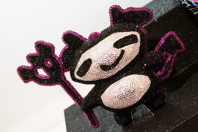Reference image illustrating Jimmy Choo x Rob Pruitt Collaboration: Playful Panda Prints and Rainbow Accessories