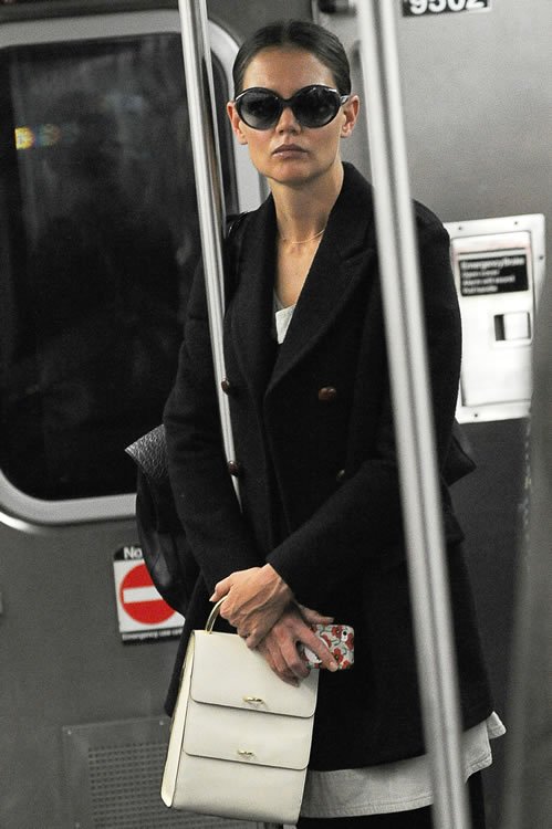 Reference image illustrating Katie Holmes’ White Top-Handle Bag: The Valextra Tip Tap That Stole the Show