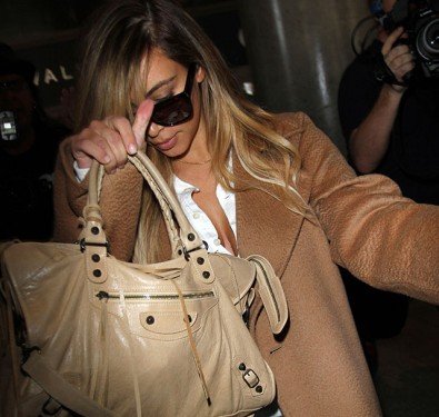 Kim Kardashian’s Beige Balenciaga City Bag: A Neutral Classic Spotted at LAX thumbnail
