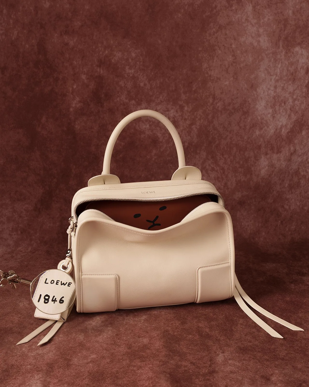 Reference image illustrating Loewe 180th Anniversary Collection: Amazona, Puzzle, and Flamenco Handbags