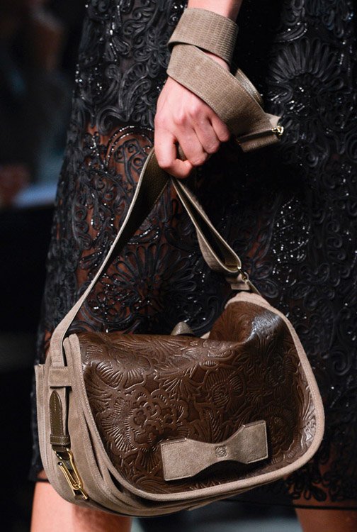 Reference image illustrating Loewe Spring 2013 Handbags: Safari-Inspired Leather Goods in Orange and Tan