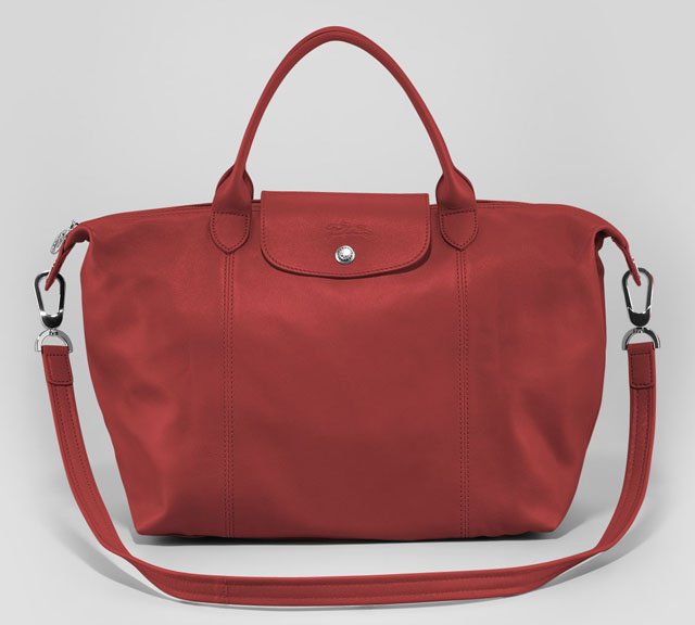 Reference image illustrating Longchamp Le Pliage Fall 2013: Python, Cuir & Plumes Totes Redefine the Classic
