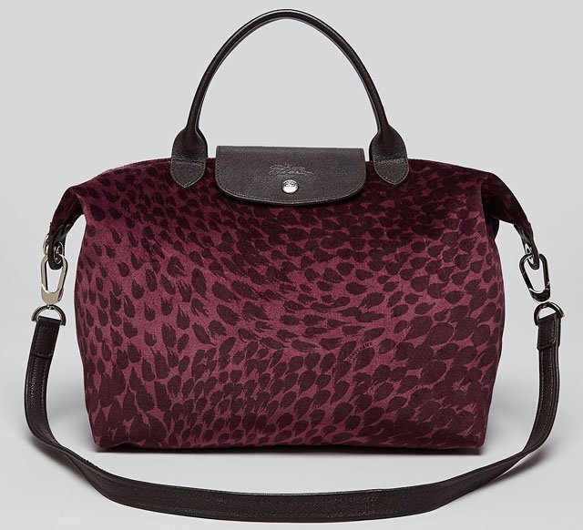 Reference image illustrating Longchamp Le Pliage Fall 2013: Python, Cuir & Plumes Totes Redefine the Classic