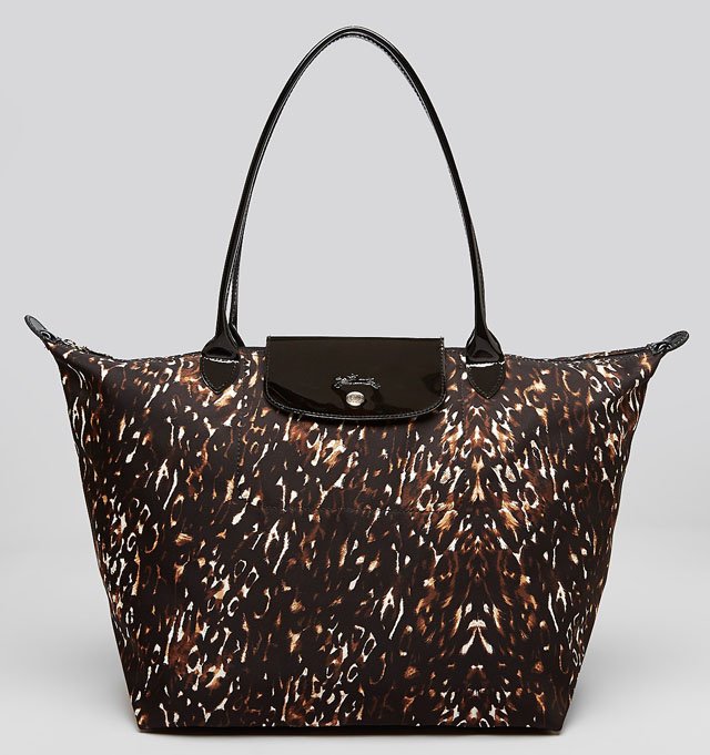 Reference image illustrating Longchamp Le Pliage Fall 2013: Python, Cuir & Plumes Totes Redefine the Classic