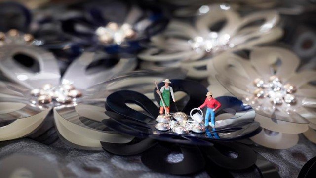 Reference image illustrating Louis Vuitton After Dark: Whimsical Miniatures Bring the Champs-Élysées Store to Life