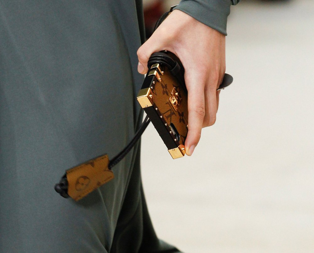 Reference image illustrating Louis Vuitton Etui iPhone 7 Case: Petite Malle-Inspired Luxury Phone Accessory Details