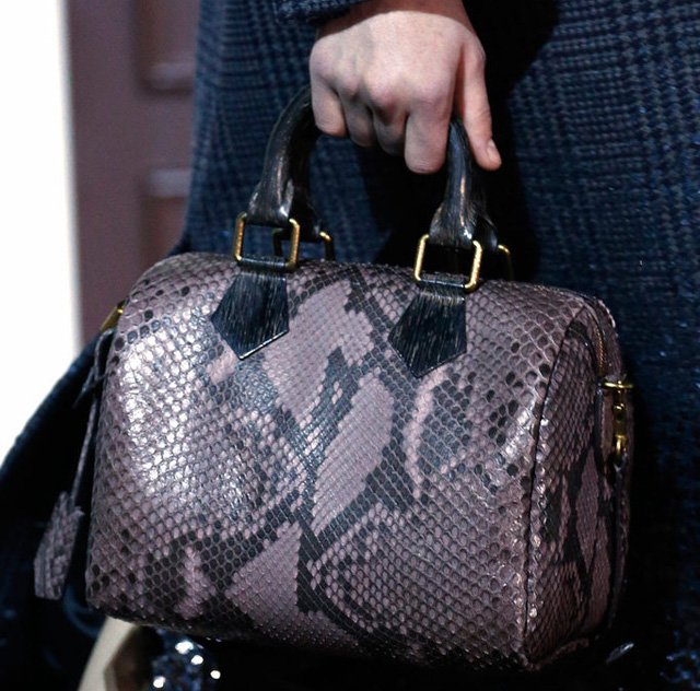 Reference image illustrating Louis Vuitton Fall 2013 Speedy Bag Reimagined in Fur, Python, and Feathers