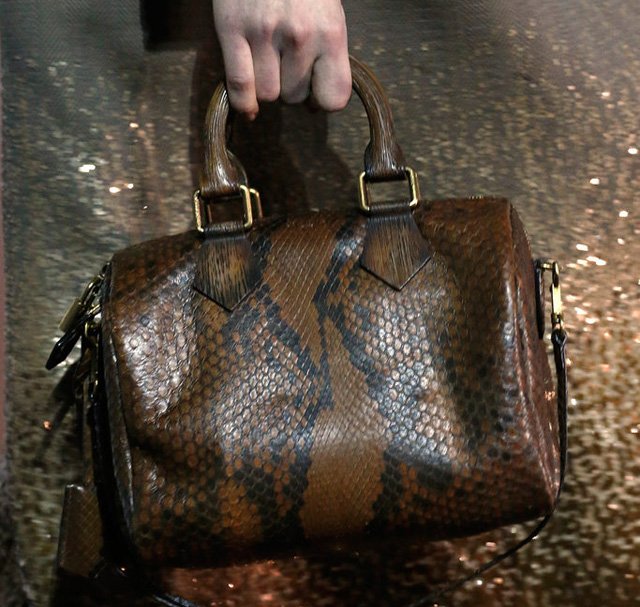 Reference image illustrating Louis Vuitton Fall 2013 Speedy Bag Reimagined in Fur, Python, and Feathers