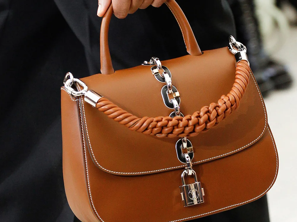 Reference image illustrating Louis Vuitton Spring 2017 Runway: New Bag Styles and a Petite Malle iPhone Case