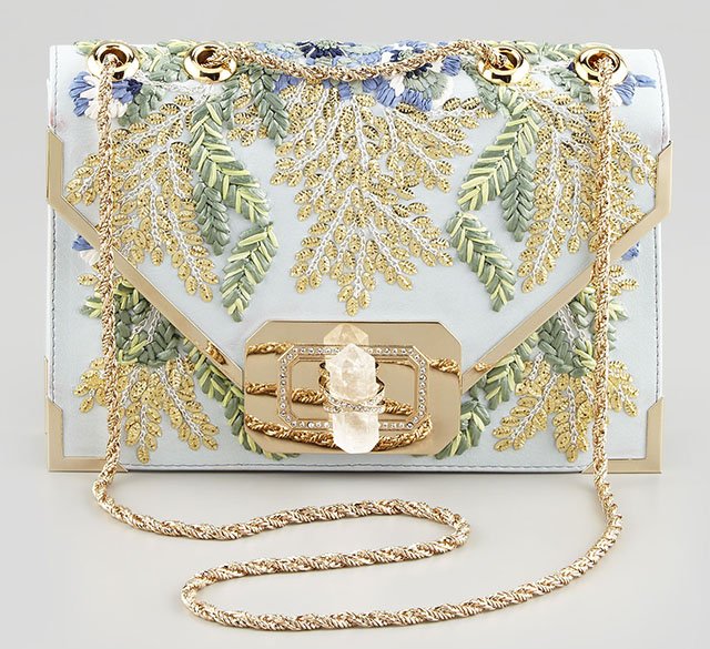 Reference image illustrating Marchesa Spring 2014 Evening Clutches: Crystal, Floral, and Laser-Cut Luxury