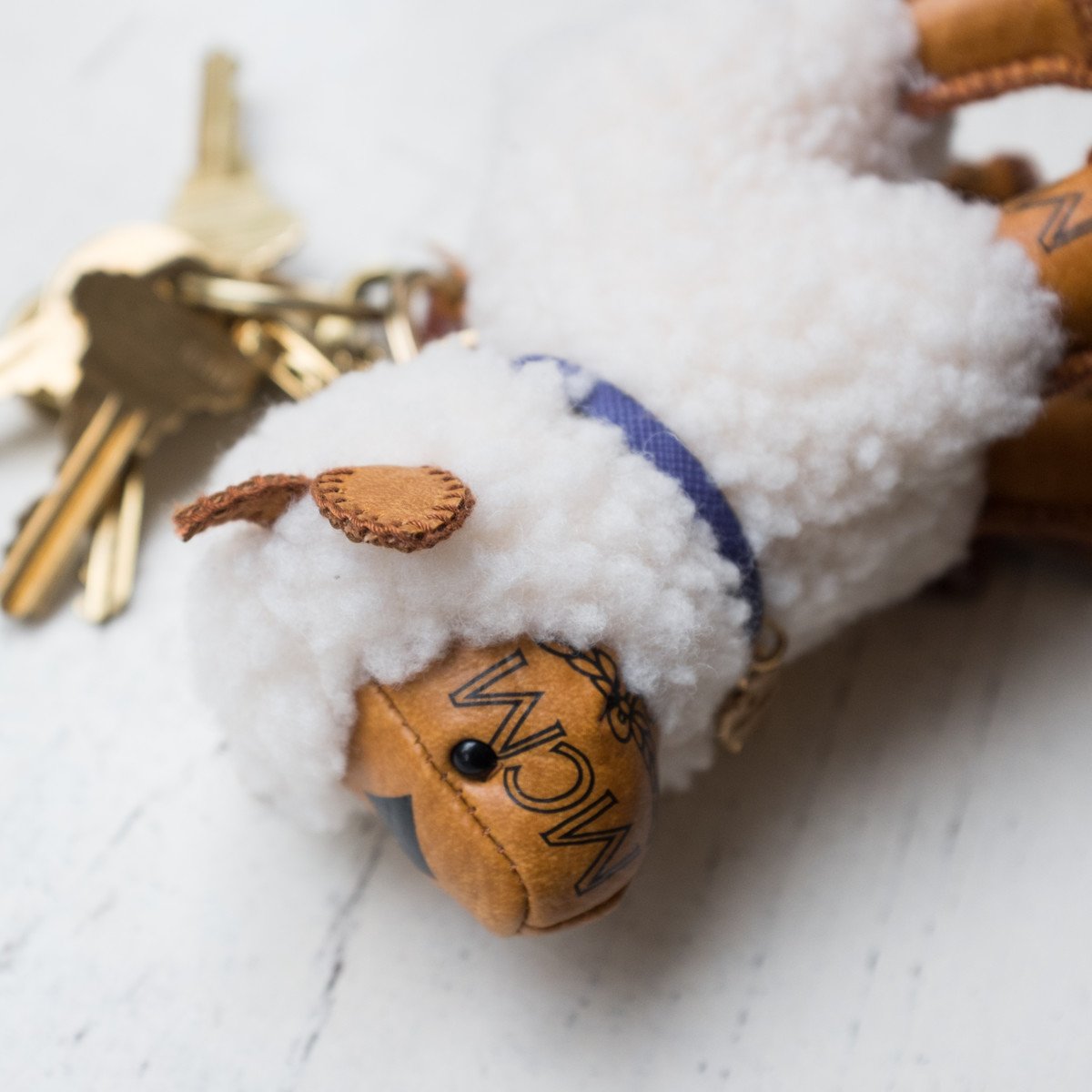 Reference image illustrating MCM Bag Charms: Playful Luxury Accents for Your Designer Handbag Collection
