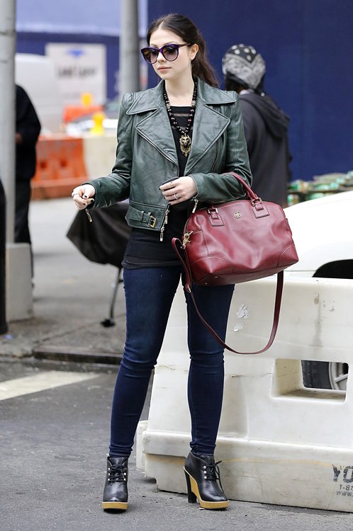 Reference image illustrating Michelle Trachtenberg’s Tory Burch Robinson Satchel and Cat Eye Sunglasses: A Street Style Look