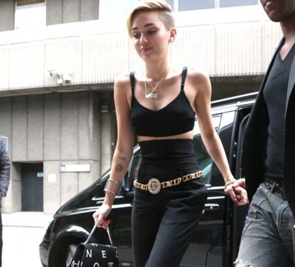 Miley Cyrus Spotted in London with a Vintage-Inspired Chanel Logo Flap Bag thumbnail