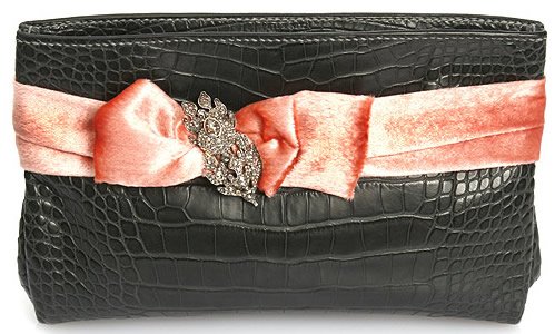 Reference image illustrating Peter Nitz Zurich: Handcrafted Exotic Clutches with Antique Brooch Details