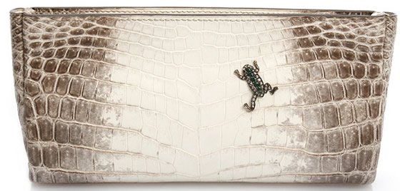 Reference image illustrating Peter Nitz Zurich: Handcrafted Exotic Clutches with Antique Brooch Details