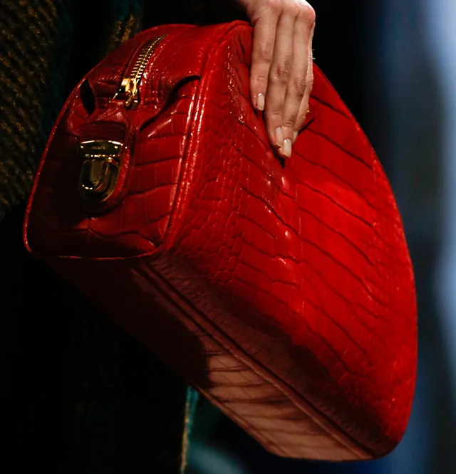 Reference image illustrating Prada Fall 2013 Handbags: Minimalist Shapes Meet Rich Textures in a Hitchcock-Inspired Collection