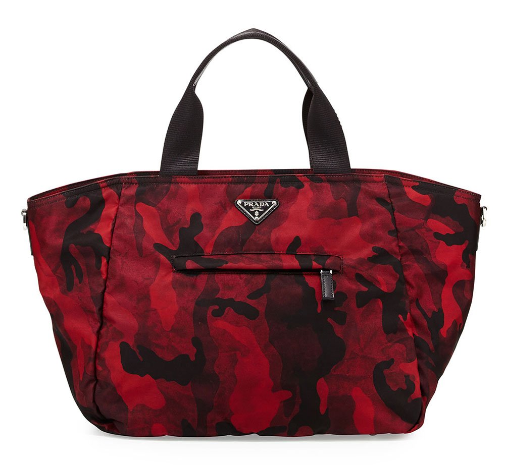 Reference image illustrating Prada Pre-Fall 2014 Handbags: Lady-Face Clutches, Camouflage Totes, and Color-Lined Bucket Bags