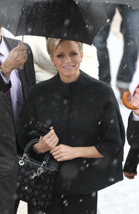 Reference image illustrating Princess Charlene of Monaco Attends Dior Haute Couture with a Black Lady Dior Tote