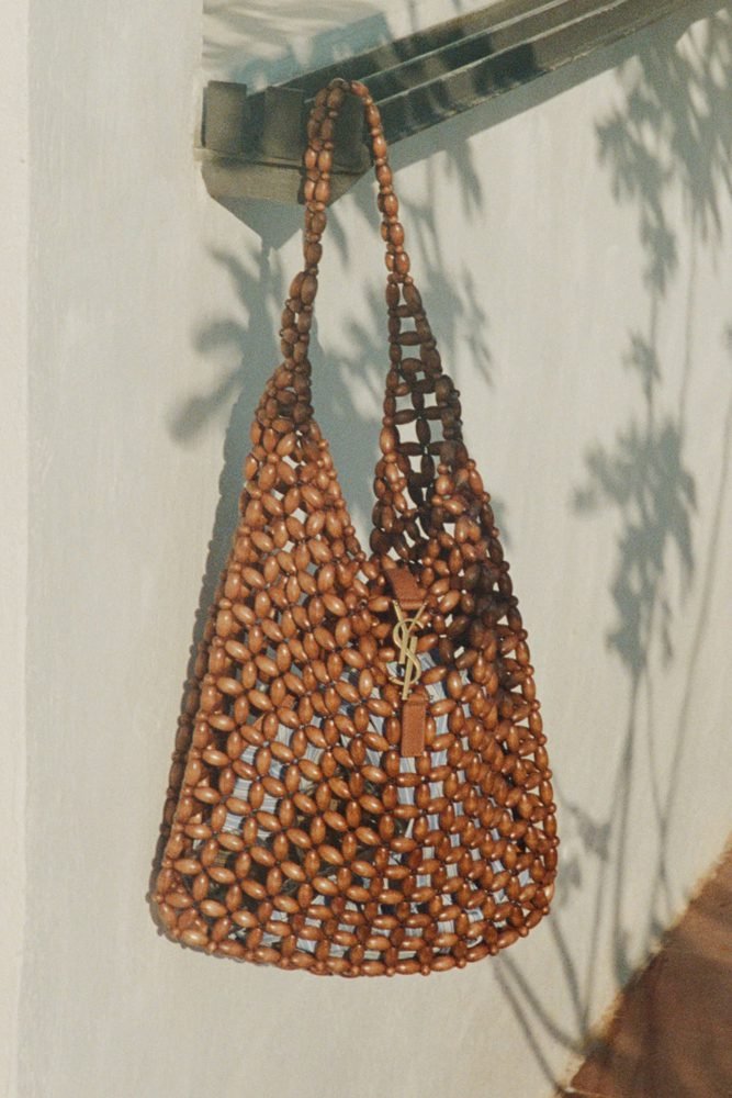 Reference image illustrating Saint Laurent Summer Mood 2026: Raffia, Beaded Wood & Le 5 à 7 Bags Reimagined