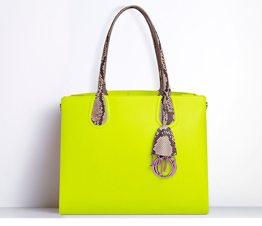 Reference image illustrating Snakeskin Handles on Luxury Handbags: Dior, Balenciaga, and Givenchy Lead the Trend