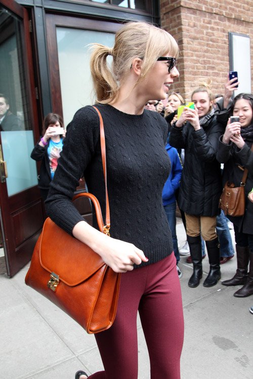 Reference image illustrating Taylor Swift Elevates Her Daytime Style with a Mark Cross Scottie Large Flap Satchel in NYC