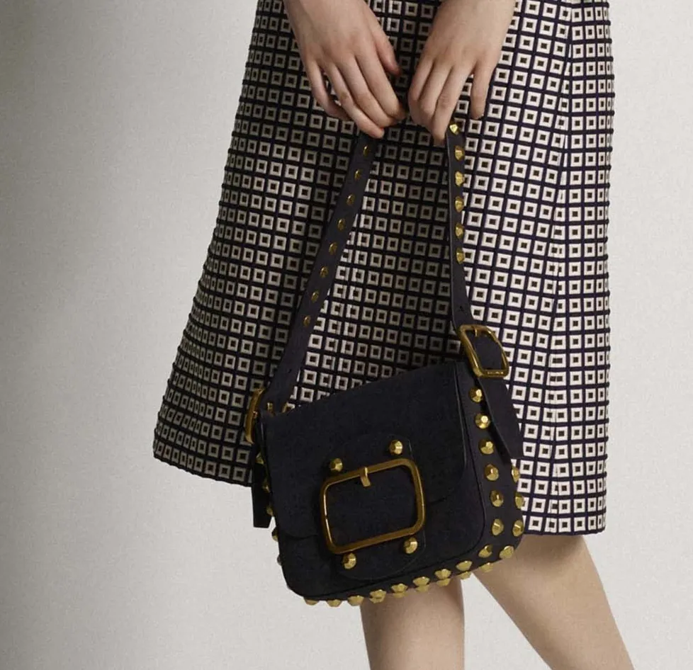 Reference image illustrating Tory Burch Pre-Fall 2017 Handbags: A Sophisticated 70s-Inspired Collection