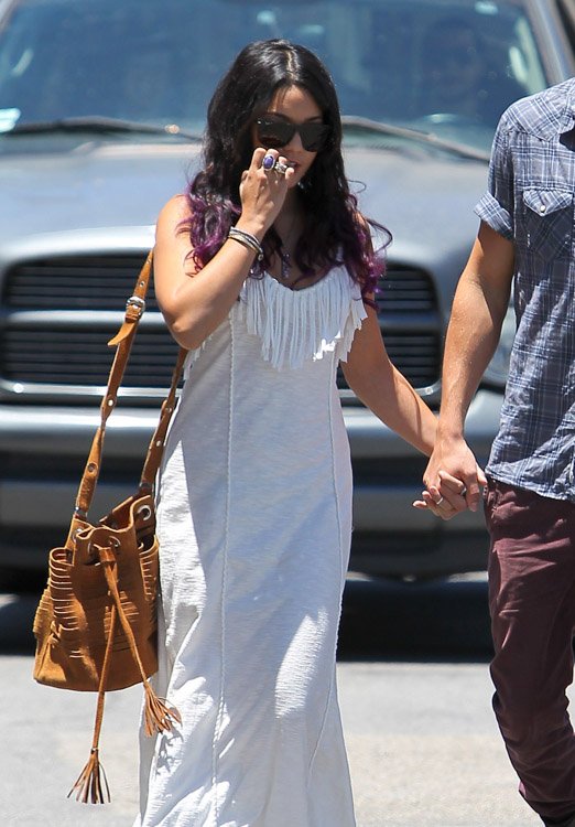 Reference image illustrating Vanessa Hudgens Handbag Collection: A Deep Dive into Her Boho-Chic Fringe and Designer Bags