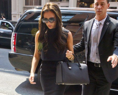 Victoria Beckham Spotted Carrying Her Own Victoria Mini Tote While Shopping at J.Crew in SoHo cover image