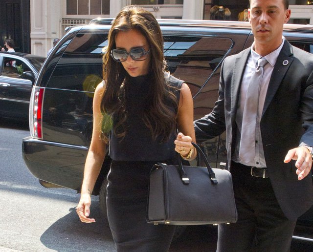 Reference image illustrating Victoria Beckham Spotted Carrying Her Own Victoria Mini Tote While Shopping at J.Crew in SoHo