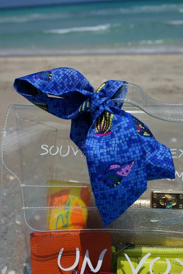 Reference image illustrating What’s Inside a Hermès Kelly Beach Bag: Summer Essentials for the Fashion-Forward