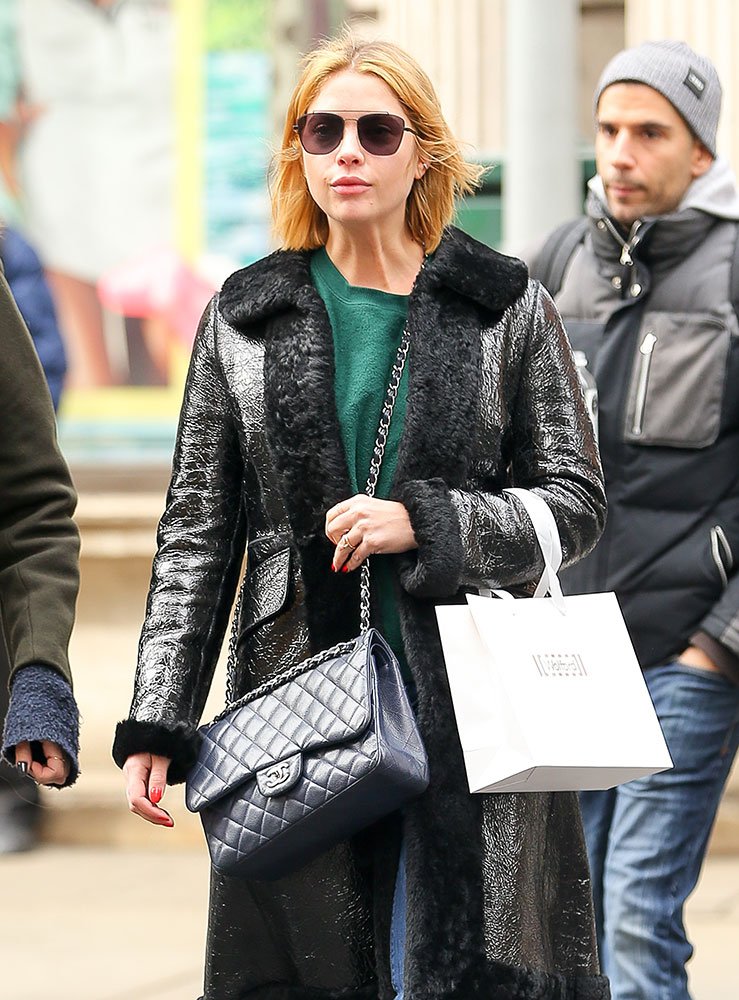 Reference image illustrating Celebrities Hide from Paparazzi with Dior, Gucci, and Chanel Bags: February 2017 Sightings