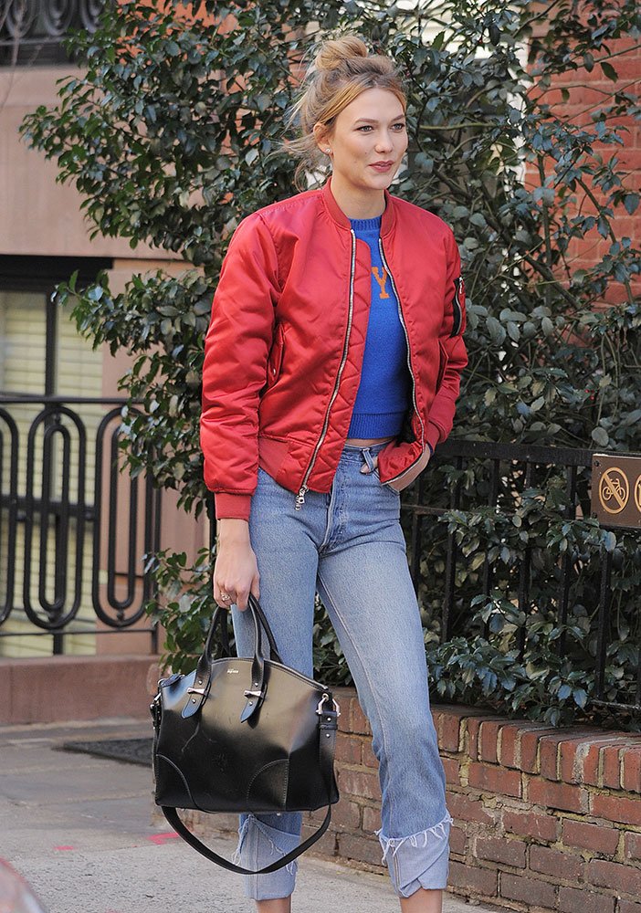 Reference image illustrating Karlie Kloss’s Favorite Black Designer Bags: Chanel, Valentino, and More