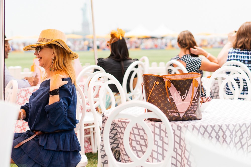Reference image illustrating Luxury Handbags and Street Style at the 2016 Veuve Clicquot Polo Classic in NYC