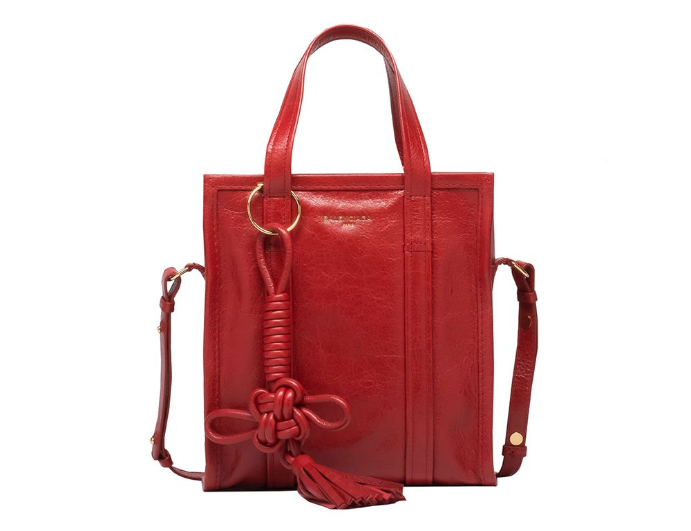 Reference image illustrating Luxury Rooster Handbags for Lunar New Year: Designer Bags and Accessories to Celebrate the Year of the Rooster