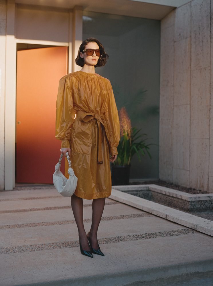 Reference image illustrating Saint Laurent Tangerine Temptation Campaign: Hailey Bieber Stars Alongside the New Hortense Hobo Bag