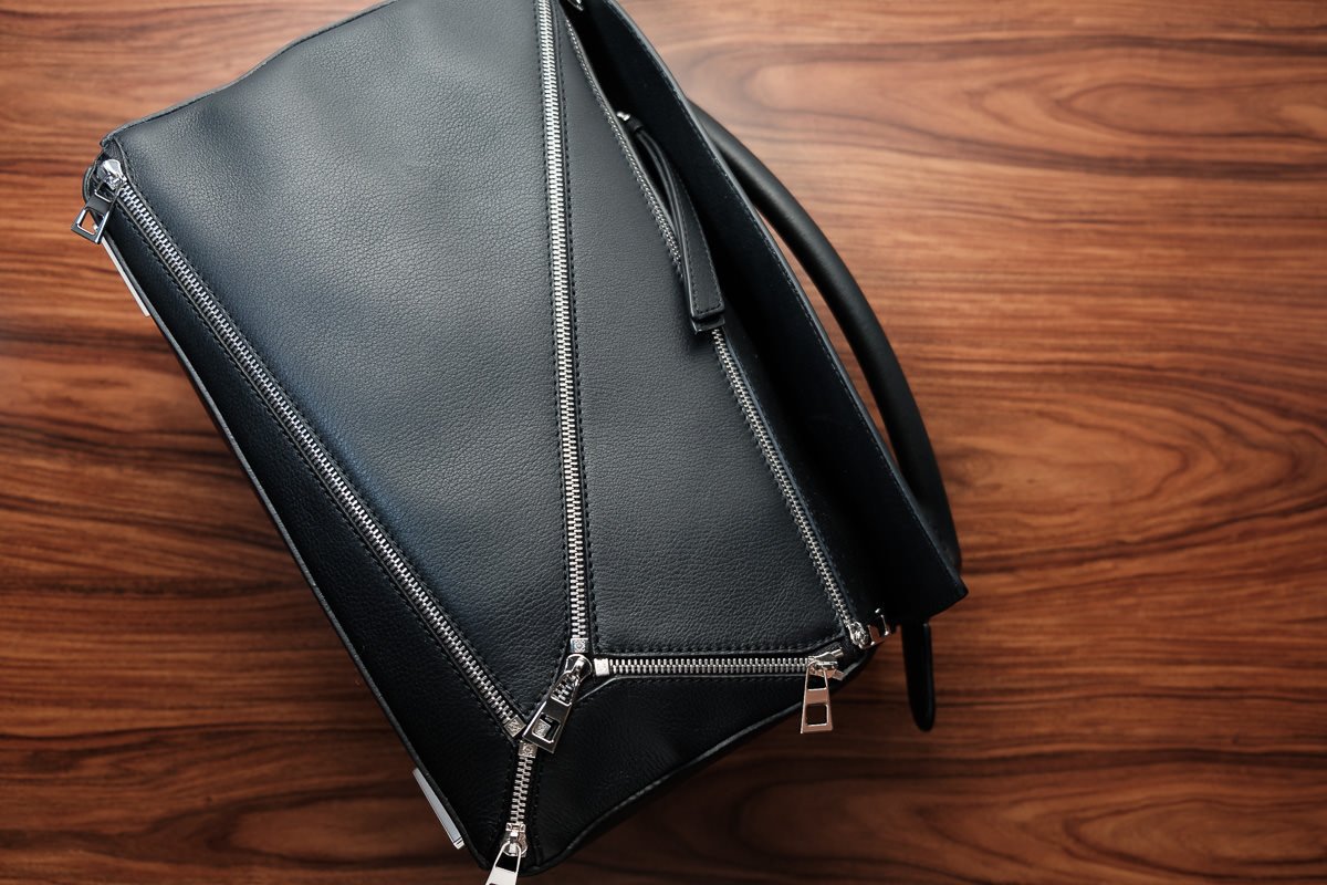 Reference image illustrating What’s Inside My Loewe Puzzle Bag: 5 Everyday Essentials for the Modern Mom