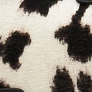 9 Standout Animal Print Handbags to Elevate Your Fall Wardrobe cover image
