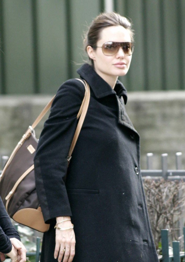 Reference image illustrating Angelina Jolie's Handbag Collection: Understated Luxury and Designer Favorites