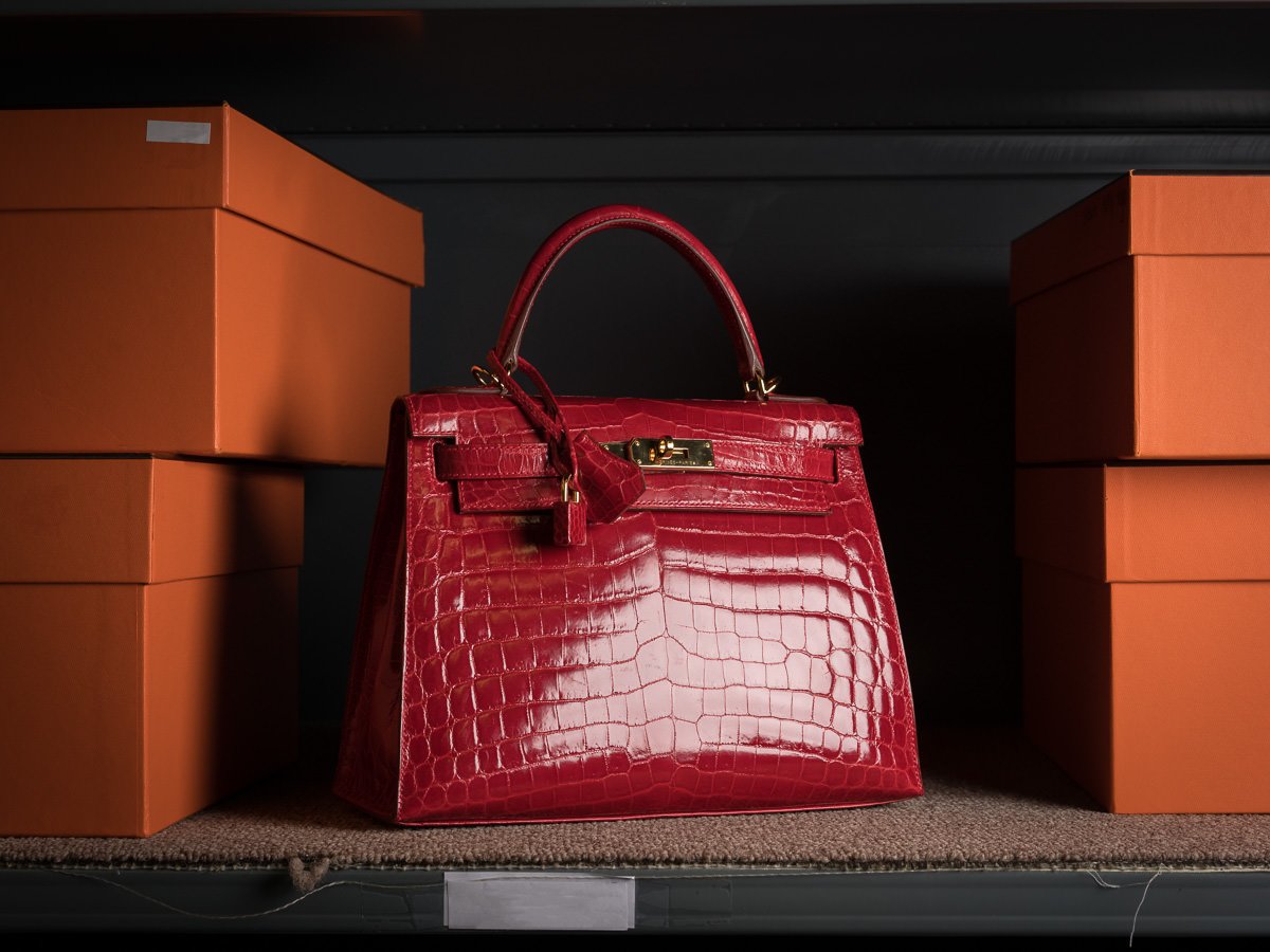 Reference image illustrating Birkin vs Kelly: Which Red Hermès Bag Commands the Auction Block?