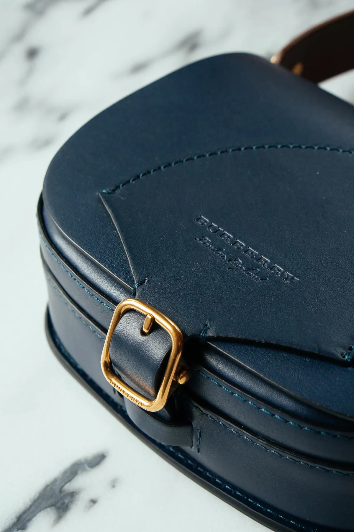 Reference image illustrating Burberry Indigo Leather Satchel Review: A Timeless Classic for the Modern Wardrobe