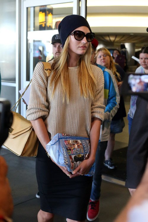 Reference image illustrating Candice Swanepoel Spotted at LAX with Her Beloved Chloe Sally Bag in Beige
